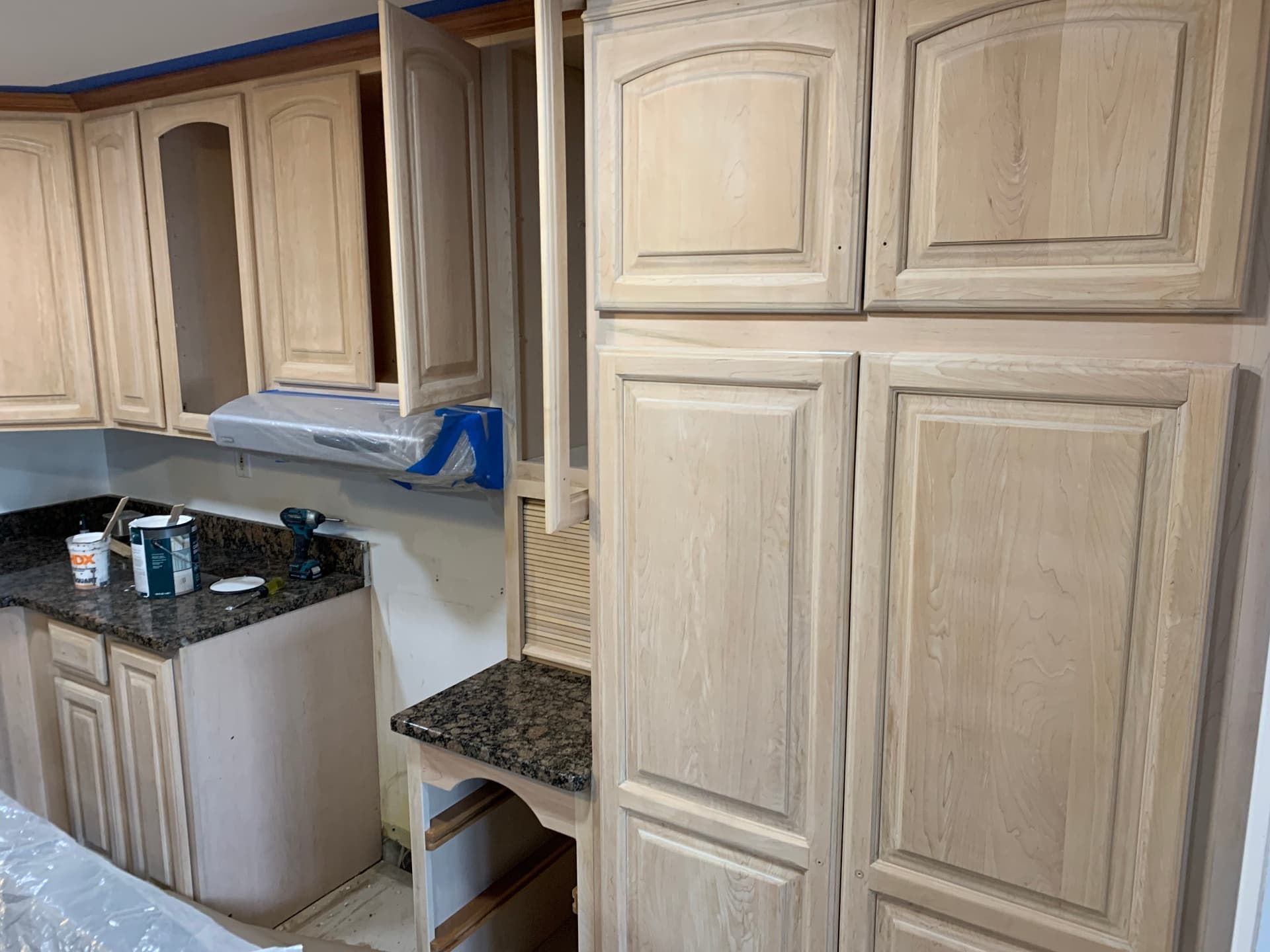 Cabinets stripped and prepped during refinishing process