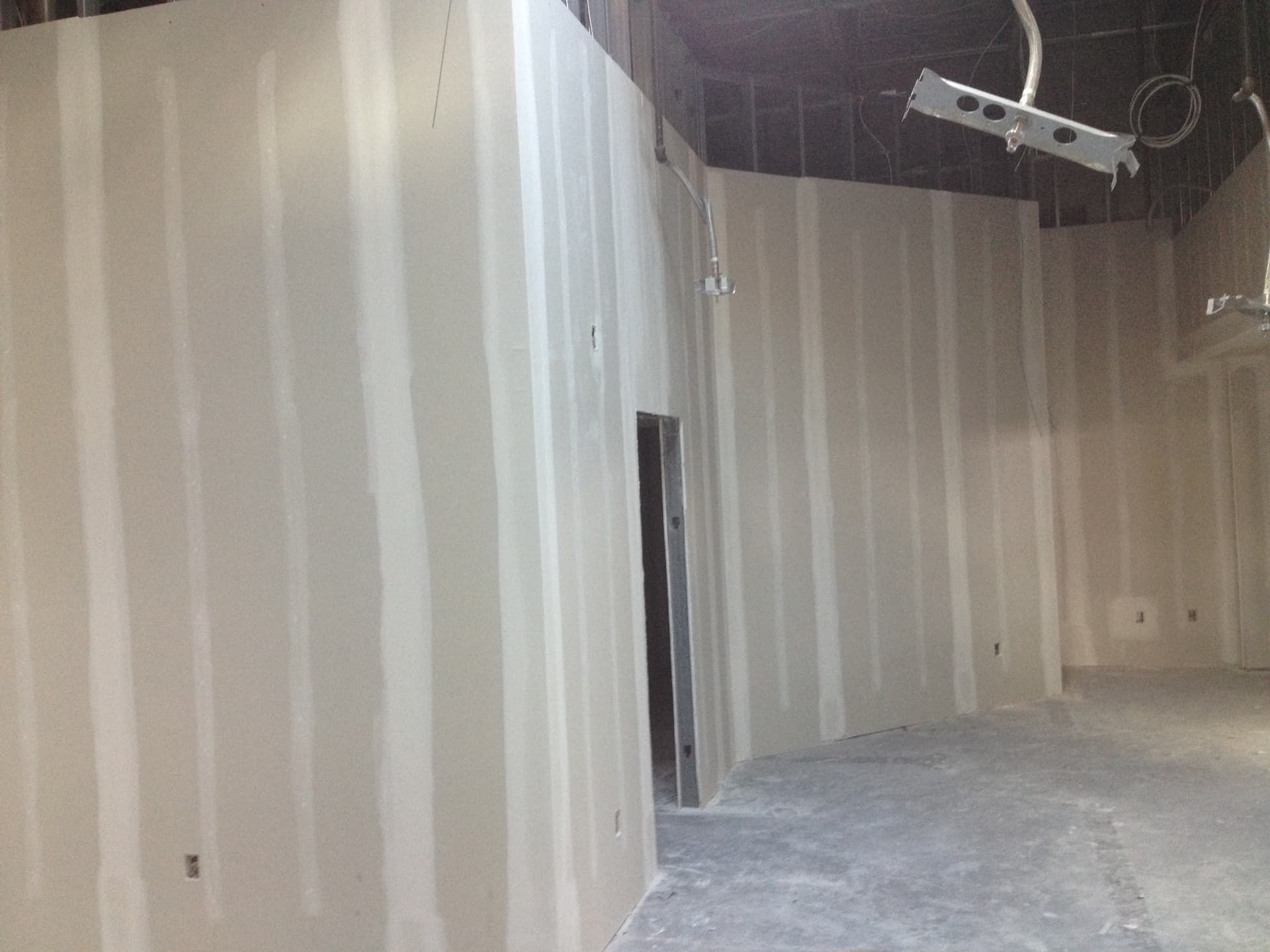Commercial space after drywall finishing and partition build-out