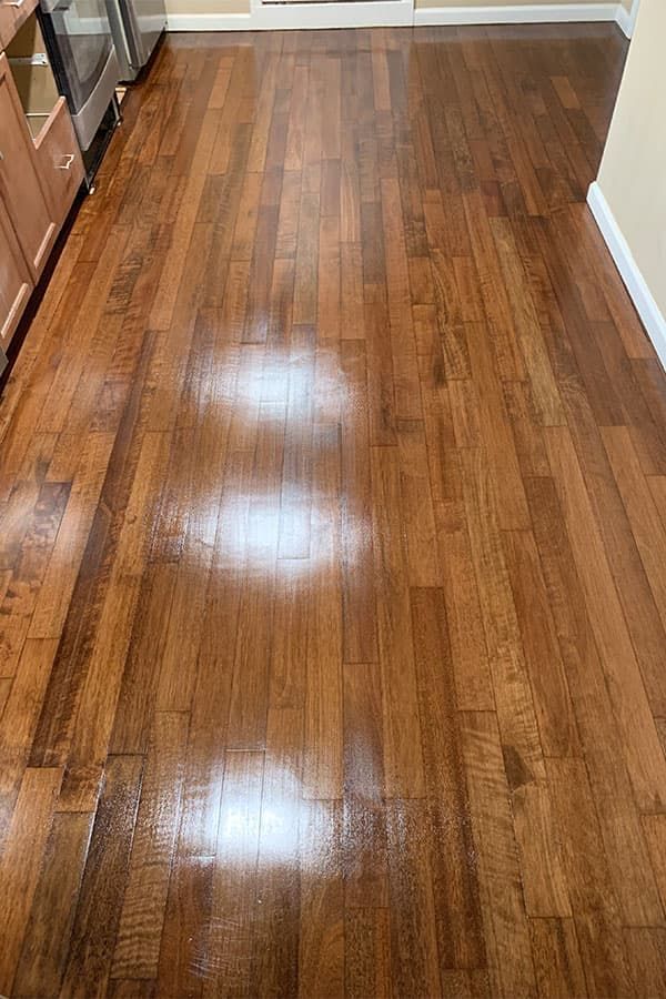 Rich stained hardwood floor, freshly sealed