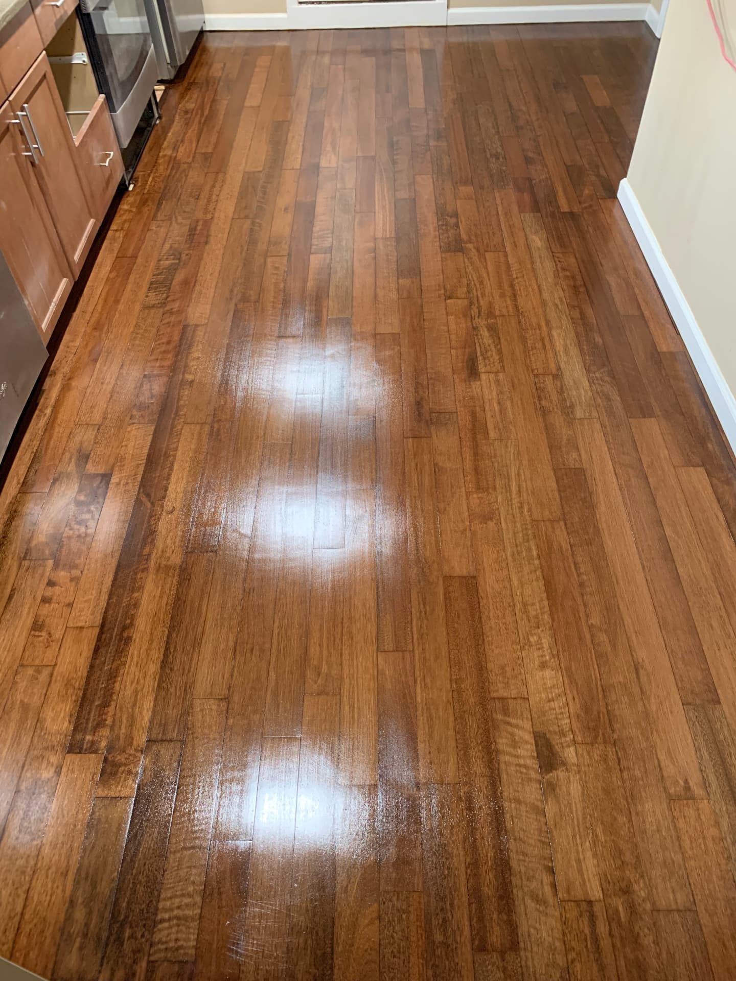 Hardwood floor after staining and sealing