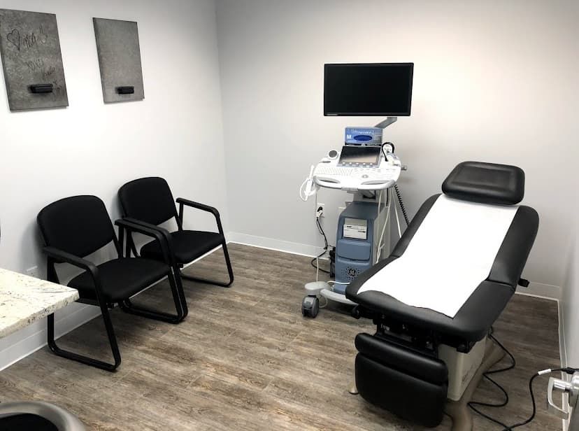 Newly painted clinical exam room with clean white walls